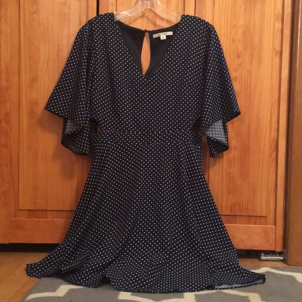 Francesca’s navy blue polka dot dress